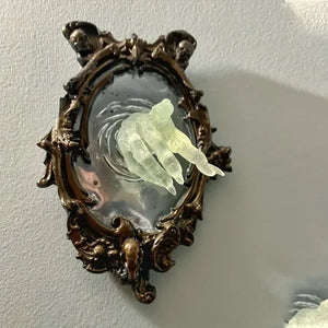 Phantom Reflection: Haunted Hand Mirror Sculpture