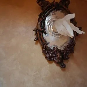 Phantom Reflection: Haunted Hand Mirror Sculpture